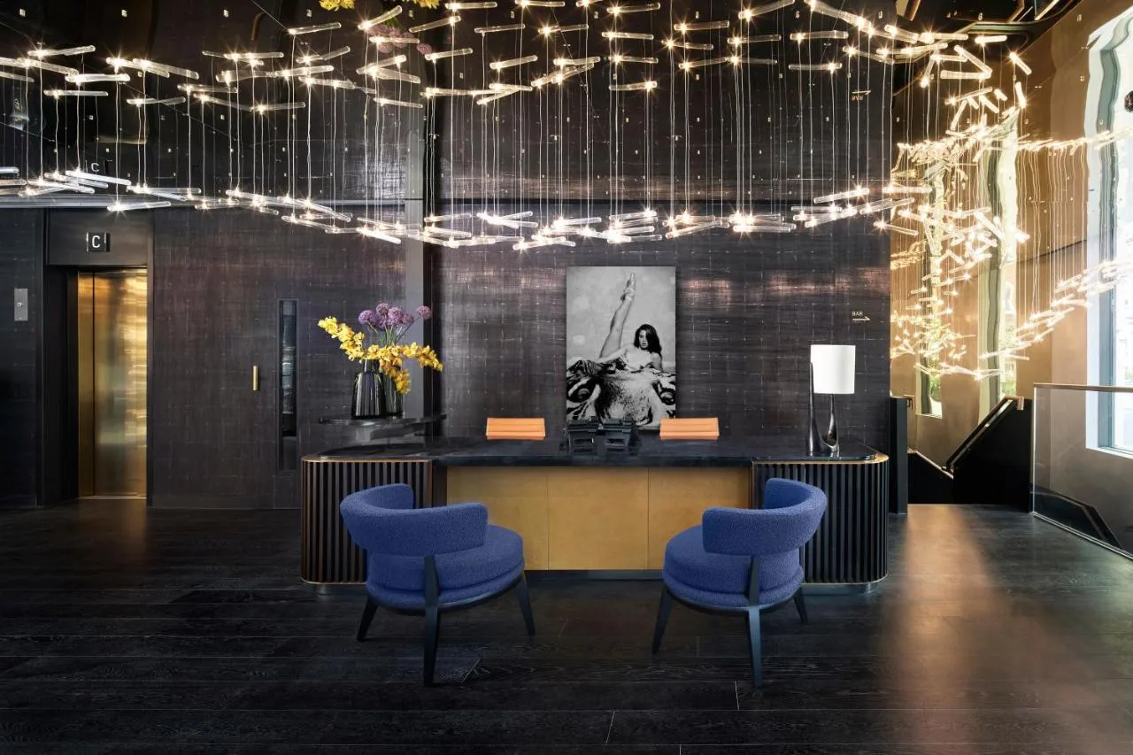 Reception counter with seating and soft lighting in the lobby