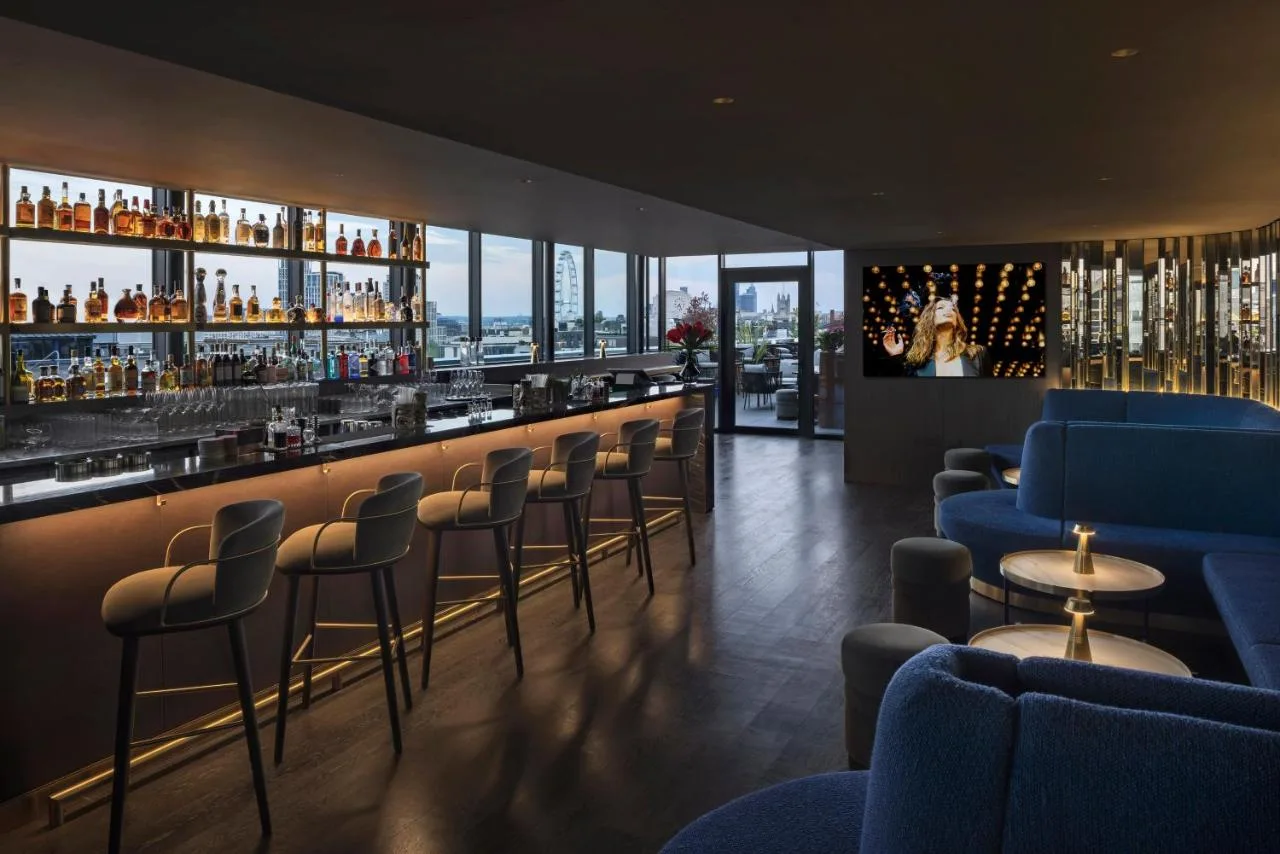 Restaurant bar area with tables and chairs