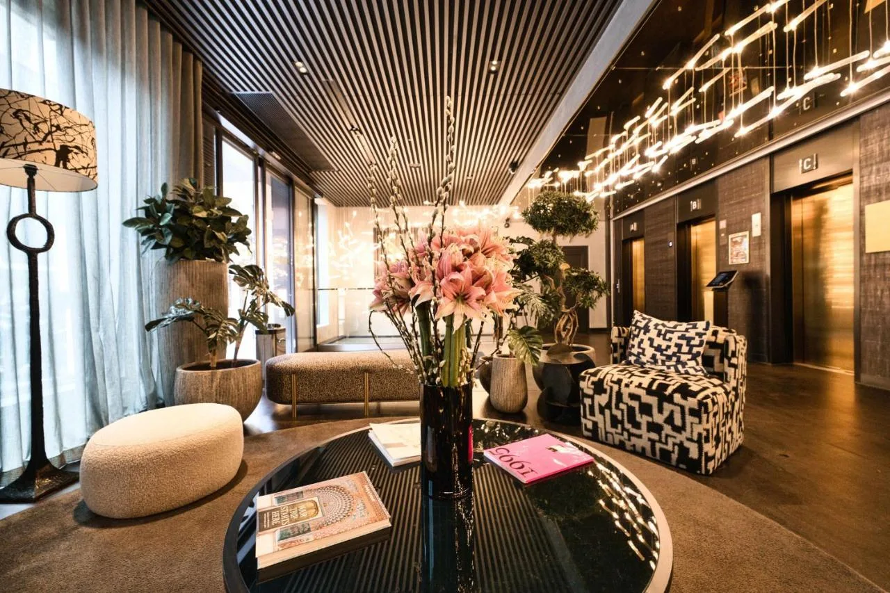 Lobby table with a floral arrangement near the entrance